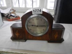 An oak mantel clock