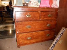 A Victorian pine 2 over 2 chest of drawers