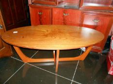 An oval shaped coffee table