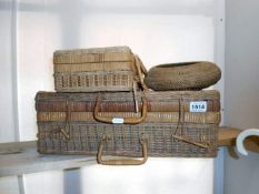 A wicker case and smaller matching case etc