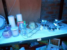 A quantity of metalware & candles etc.