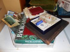 A quantity of playing cards, postcards & Backgammon etc.