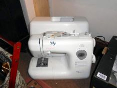 A Janome MyExcel 4023 sewing machine in case