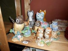A quantity of owls & cat figures