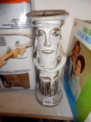 A clay formed man pot