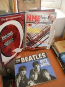 An album containing Beatles and other magazines