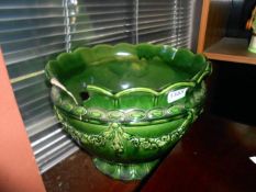 A large green planter A/F