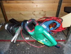 A hedge trimmer, reciprocating saw & car lamp