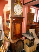 A grandfather clock (hood in pieces)