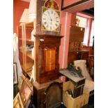 A grandfather clock (hood in pieces)