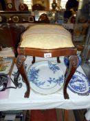 An old wooden footstool