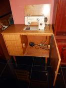 A Riccar Reliant 88 sewing machine in cabinet