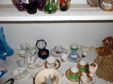 A quantity of miniature teaware