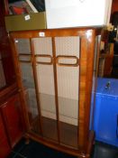 A glass fronted display cabinet