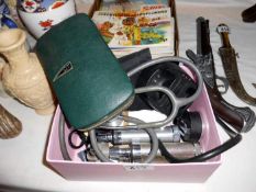 A collection of stethoscopes, otoscopes and medical instruments etc