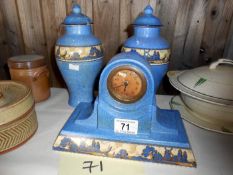 A ceramic clock garniture