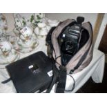 A camcorder in bag etc