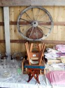 A mixed lot of wooden items including cart wheel