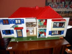 A dolls house & furniture