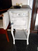 A French style marble topped cabinet
