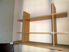 A miniature bookshelf/dvd rack