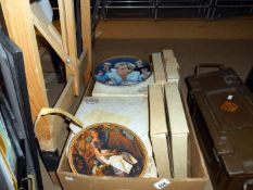A box of collectors plates including Normam Rockwell