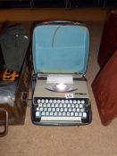 A Boots Nippo 200 typewriter in case