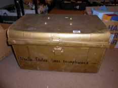A tin trunk, missing handle