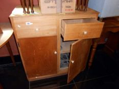 A pine kitchen cupboard