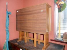 A formica topped gate leg table