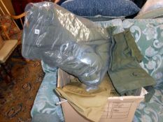 A box of camouflage clothing etc.