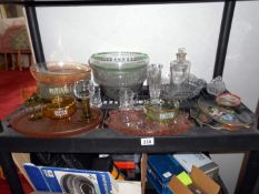 A shelf of glassware including Coronation ware