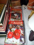 A collection of Arsenal FC football programmes