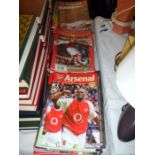 A collection of Arsenal FC football programmes