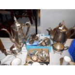 A quantity of silverplate including teapots