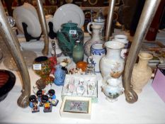 A quantity of pottery and china and figurines