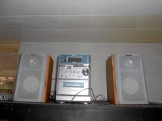 A Sony CD/Tape player with speakers