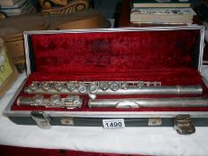 A cased Boosey and Hawkes 400 silver plated flute