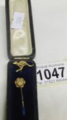 A Victorian 15ct gold stick pin and a kangaroo stick pin