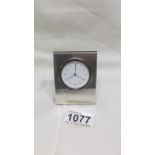 A small HM silver cases clock,