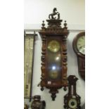 A long Victorian Vienna wall clock,