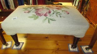 A tapestry footstool