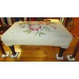 A tapestry footstool