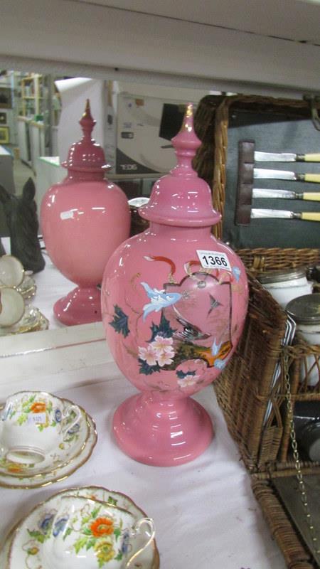 A Victorian hand painted overlaid pink glass lidded vase