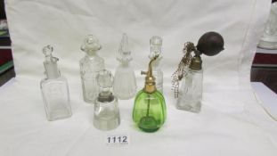 6 perfume bottles/atomisers including silver rim and a Wembley 1924 advertising bottle with stopper