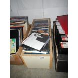 A box of mostly 1970/80's 45 rpm records