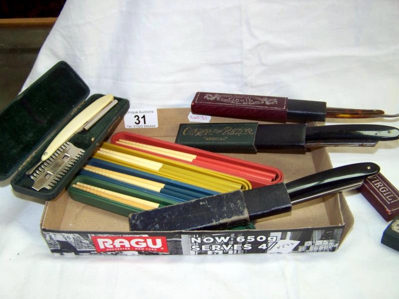 A set of 4 cased pairs of vintage chopsticks and 2 cased cut throat razors