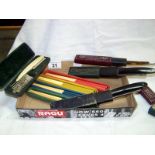 A set of 4 cased pairs of vintage chopsticks and 2 cased cut throat razors