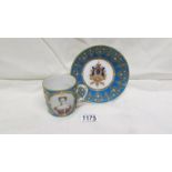 A Sevres cabinet cup and saucer in jewelled blue celeste porcelain with the cup bearing the