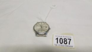 An Omega automatic watch head,